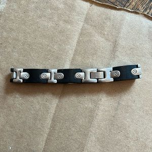 STEEL BOLTED BRACELET GOOD COND